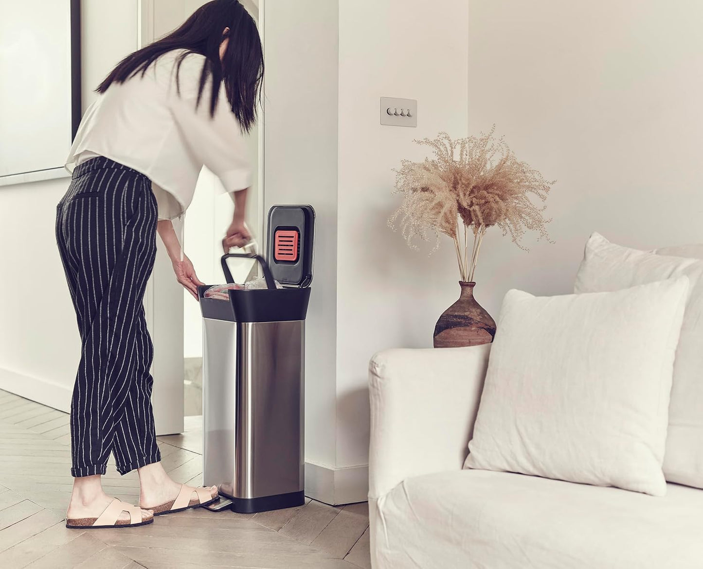 This smart trash can has a 90-liter capacity when compacted and also comes with a trash can with an odor filter